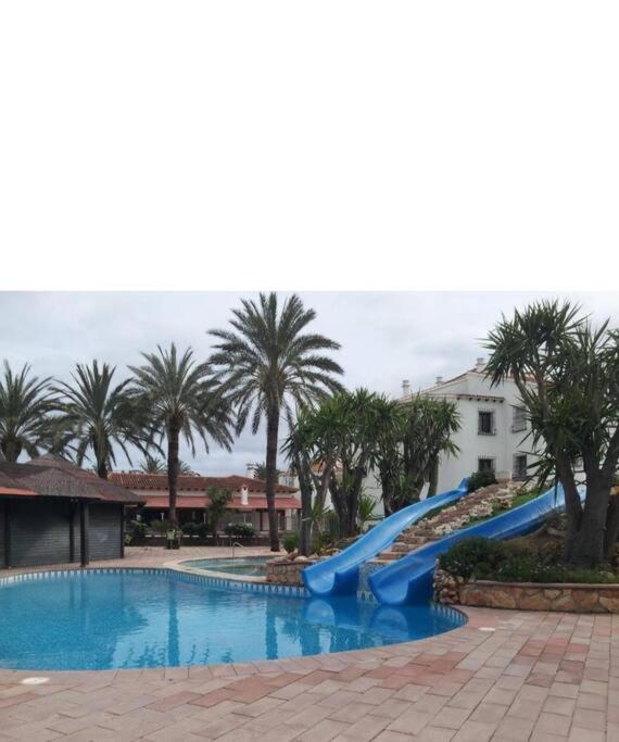 En Denia, Urbanizacion El Palmar Con Piscina, Toboganes Y Chiringuito Apartamento *