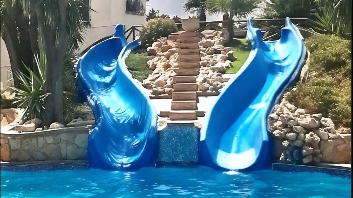 3 Minutes From The With Swimming Pools, Slides, And A Bar Apartamento