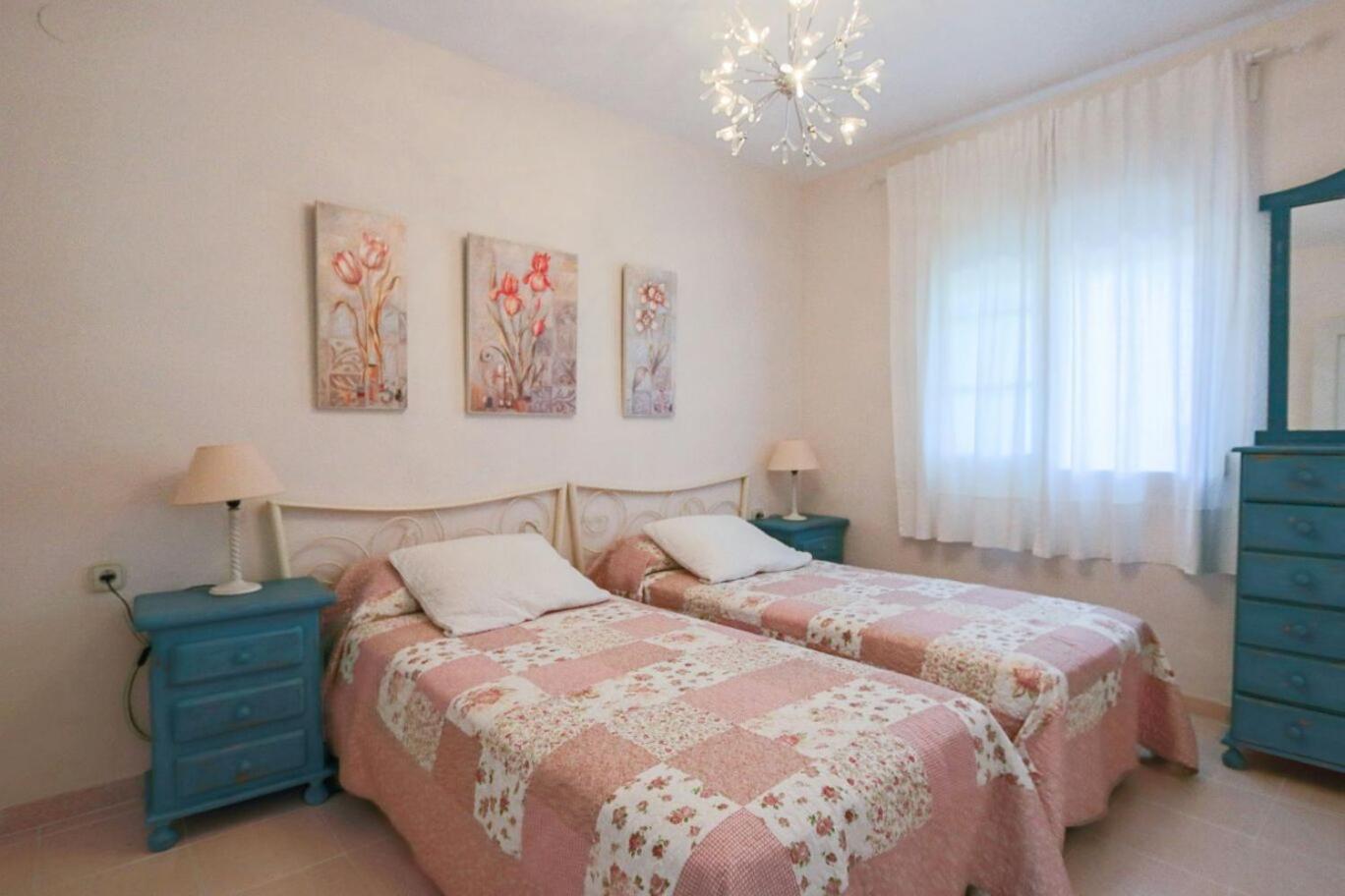 1 * Denia